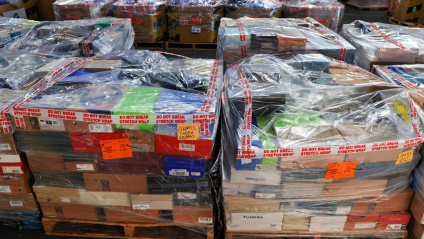 palletized inventory shrink-wrapped for international freight.